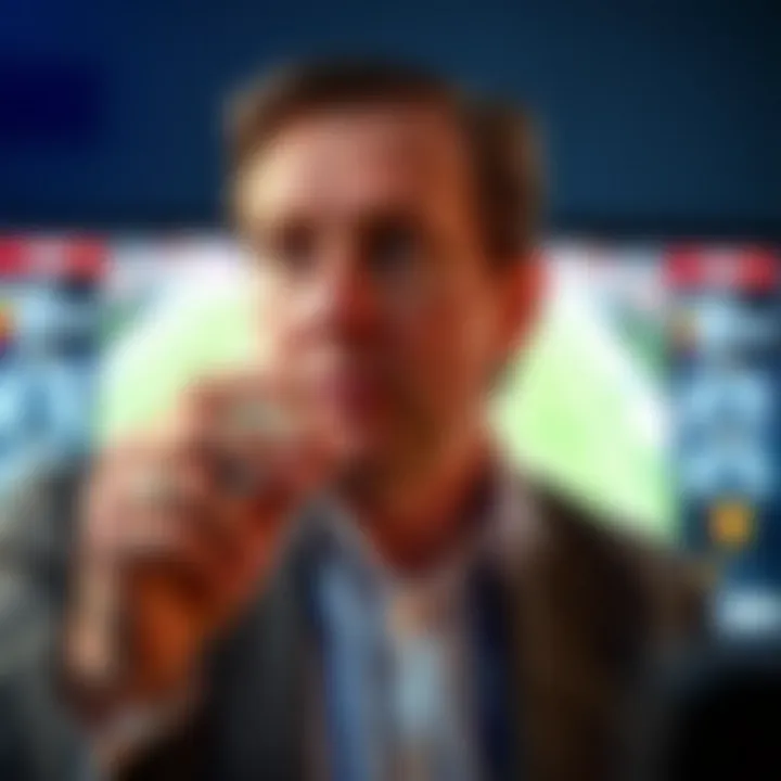 Paul Merson analyzing Premier League football tactics on a digital screen